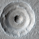 Illustration for article titled Marss remarkable Bulls-Eye Crater could hide underground ice